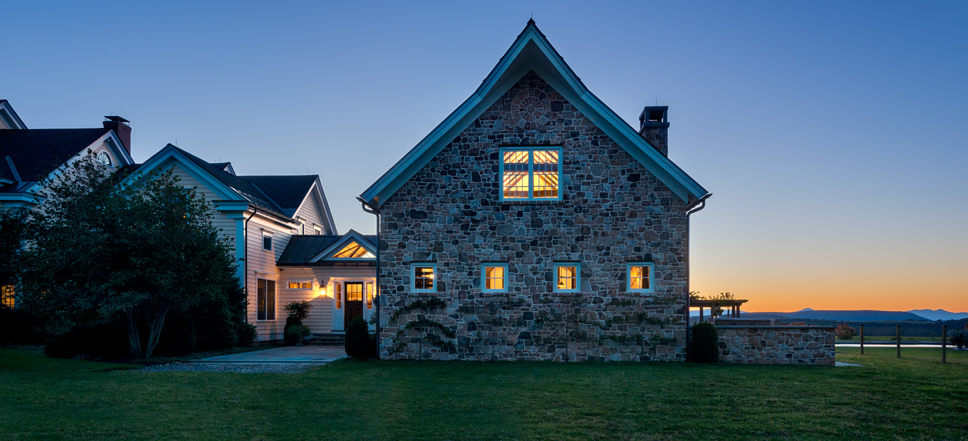 Stone Family Room Addition at Dusk