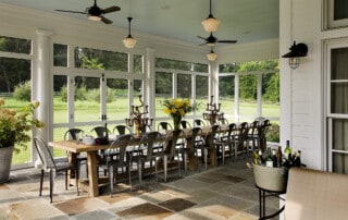 Screened Porch With Large Dining Table